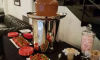 Delicious strawberries patiently waiting to be dipped into the chocolate fountain.